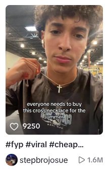 Screenshot of a TikTok with 1.6M views. A young man with curly hair is holding up his gold cross necklace. The caption says "every needs to buy this cross necklace for the summer".